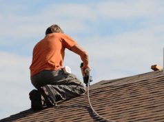 Sydney worker restoring a roof